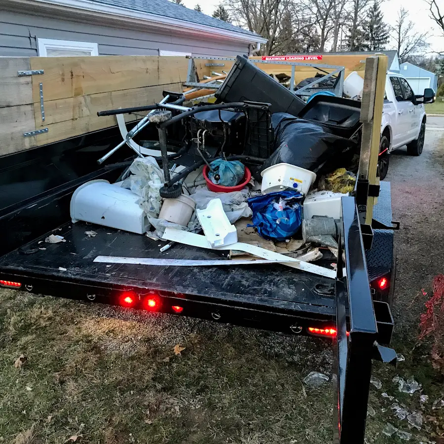Roll-off dumpster delivered to a residential driveway in Fairview