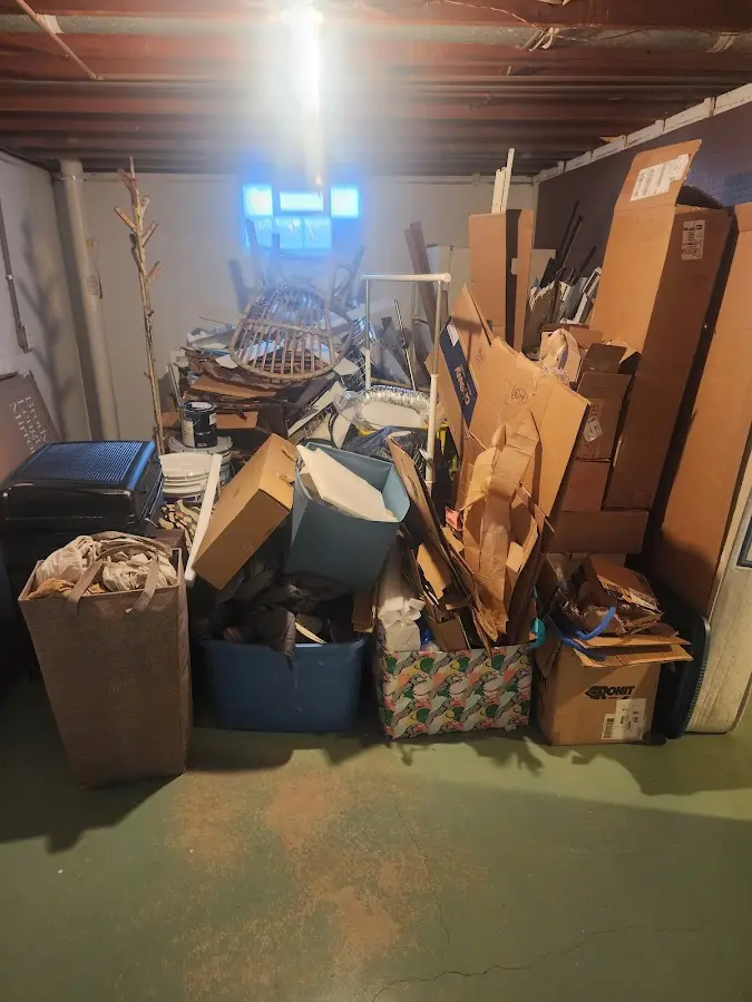 Roll-off dumpster container at job site for 4 Yard Dumpster Rental in Fairview